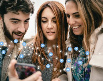 Social network and connection concept with young people using smartphone - digital composition with icons and connectivity lines to draw a mesh network