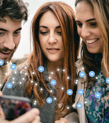 Social network and connection concept with young people using smartphone - digital composition with icons and connectivity lines to draw a mesh network
